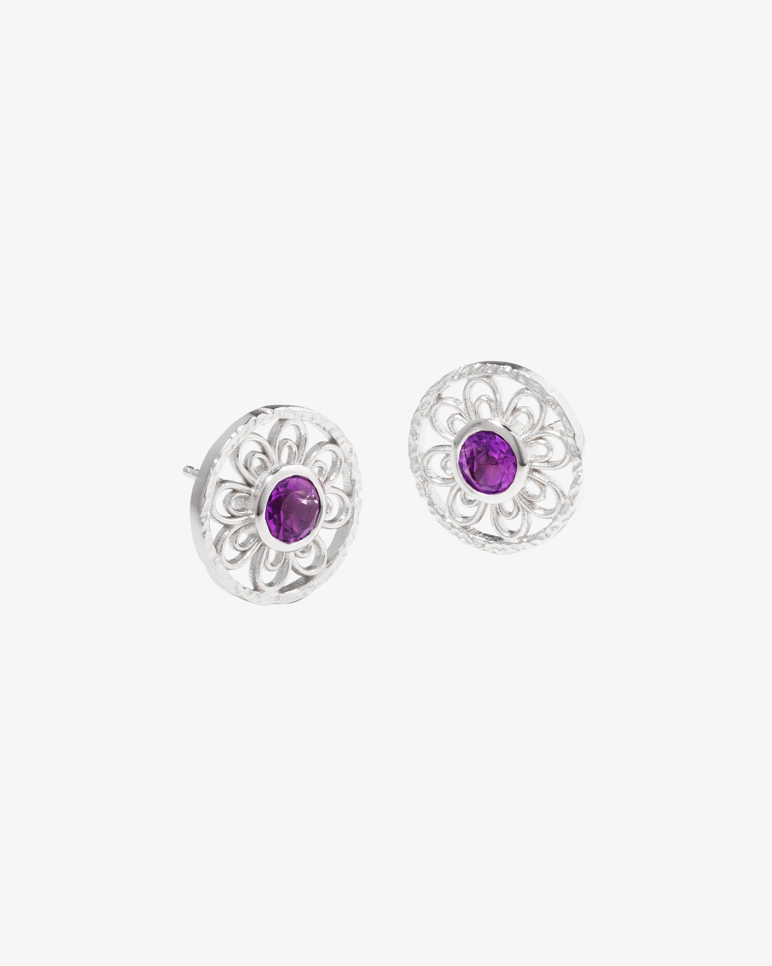 Close view of the silver Amethyst Clover earring showing the granulated edge and amethyst stone